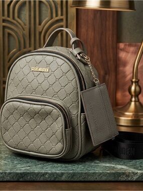 NWOT Steve Madden Stone/Sage
Green Quilted Mini Backpack